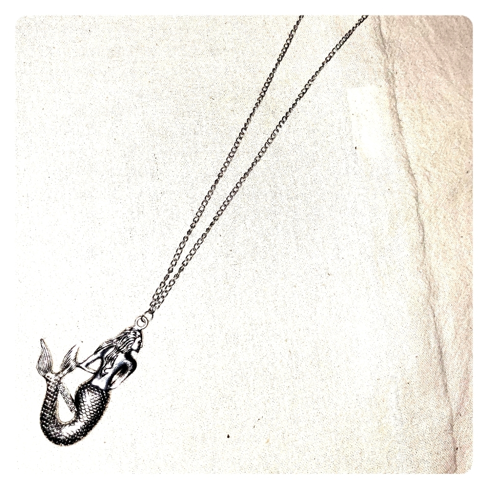 EUC Silver Tone Laghcat Mermaid long Necklace